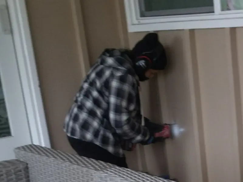 Professional electrician installing an exterior outlet in Cordele